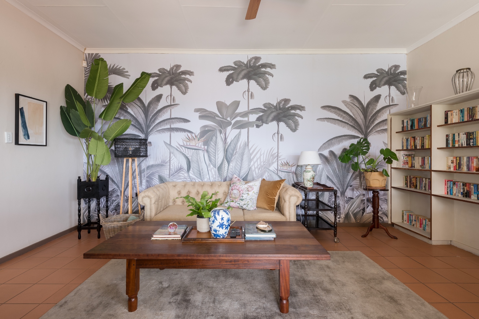 Reading lounge with botanical wallpaper